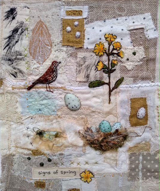 Textile art with birds and flowers