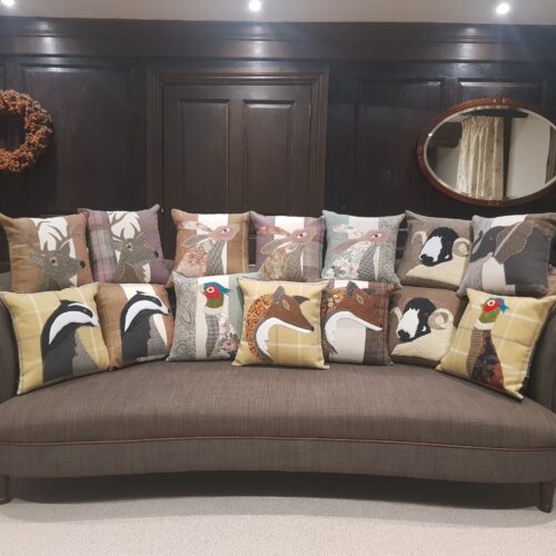 Sofa with textile animal cushios